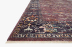 Burgundy distressed rug with ornate floral patterns in cream and rust tones