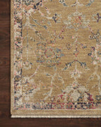 Vintage-inspired area rug with warm tan, blue, and purple tones in traditional pattern