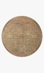 Vintage-inspired area rug with warm tan, blue, and purple tones in traditional pattern