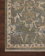 Gray traditional rug with floral botanical pattern and cream border