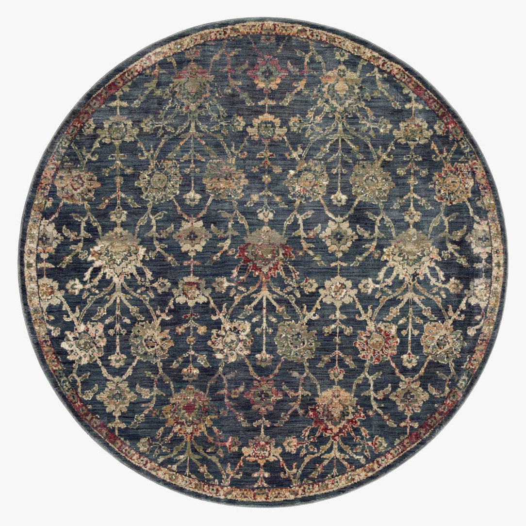 Dark blue traditional rug with ornate floral damask pattern in cream and rose tones