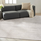Neutral beige textured area rug with subtle linear pattern and natural fiber appearance