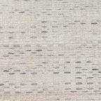 Neutral beige textured area rug with subtle linear pattern and natural fiber appearance