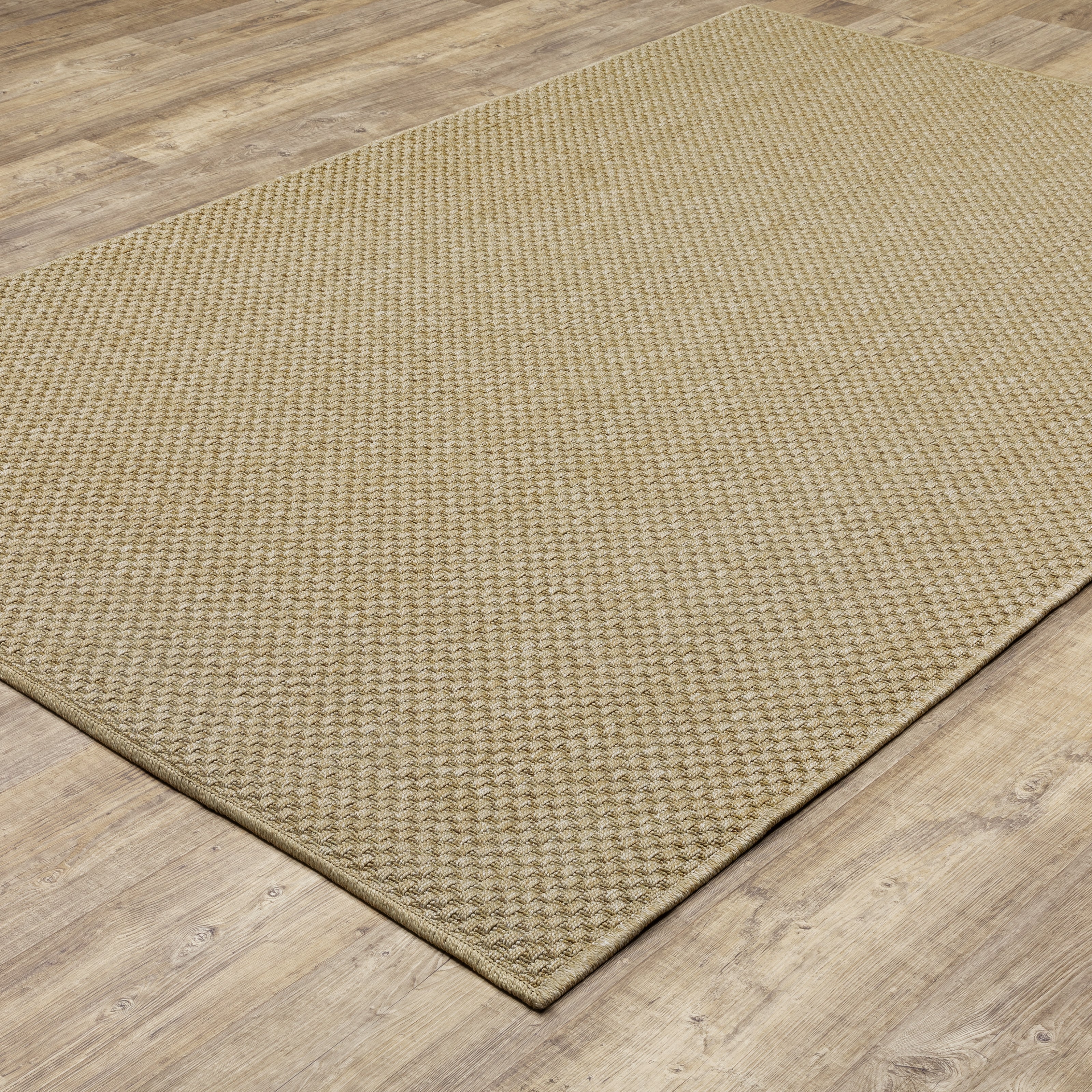 Natural beige textured woven rug with subtle crosshatch pattern