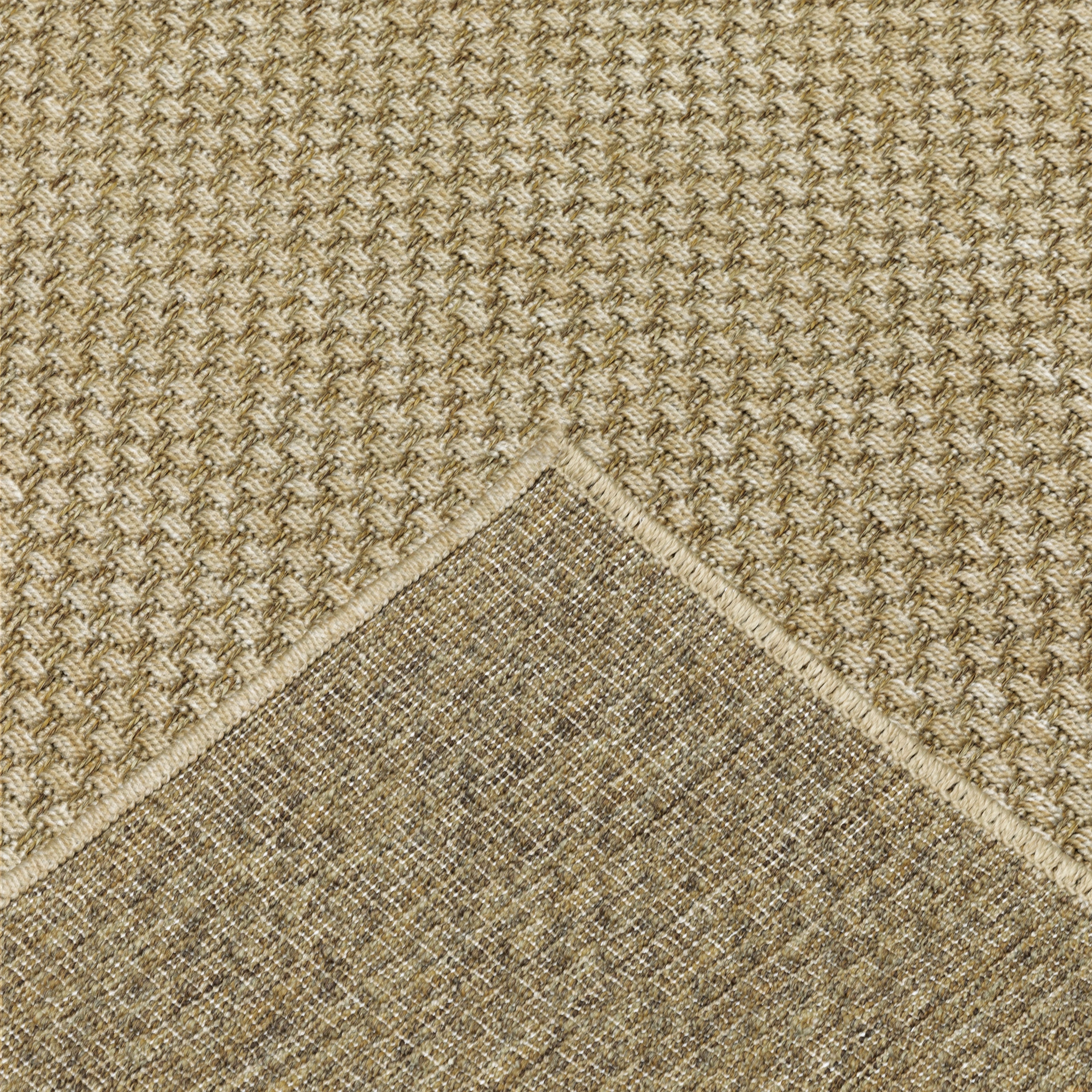 Natural beige textured woven rug with subtle crosshatch pattern
