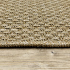 Natural beige textured woven rug with subtle crosshatch pattern