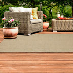 Natural beige textured woven rug with subtle crosshatch pattern