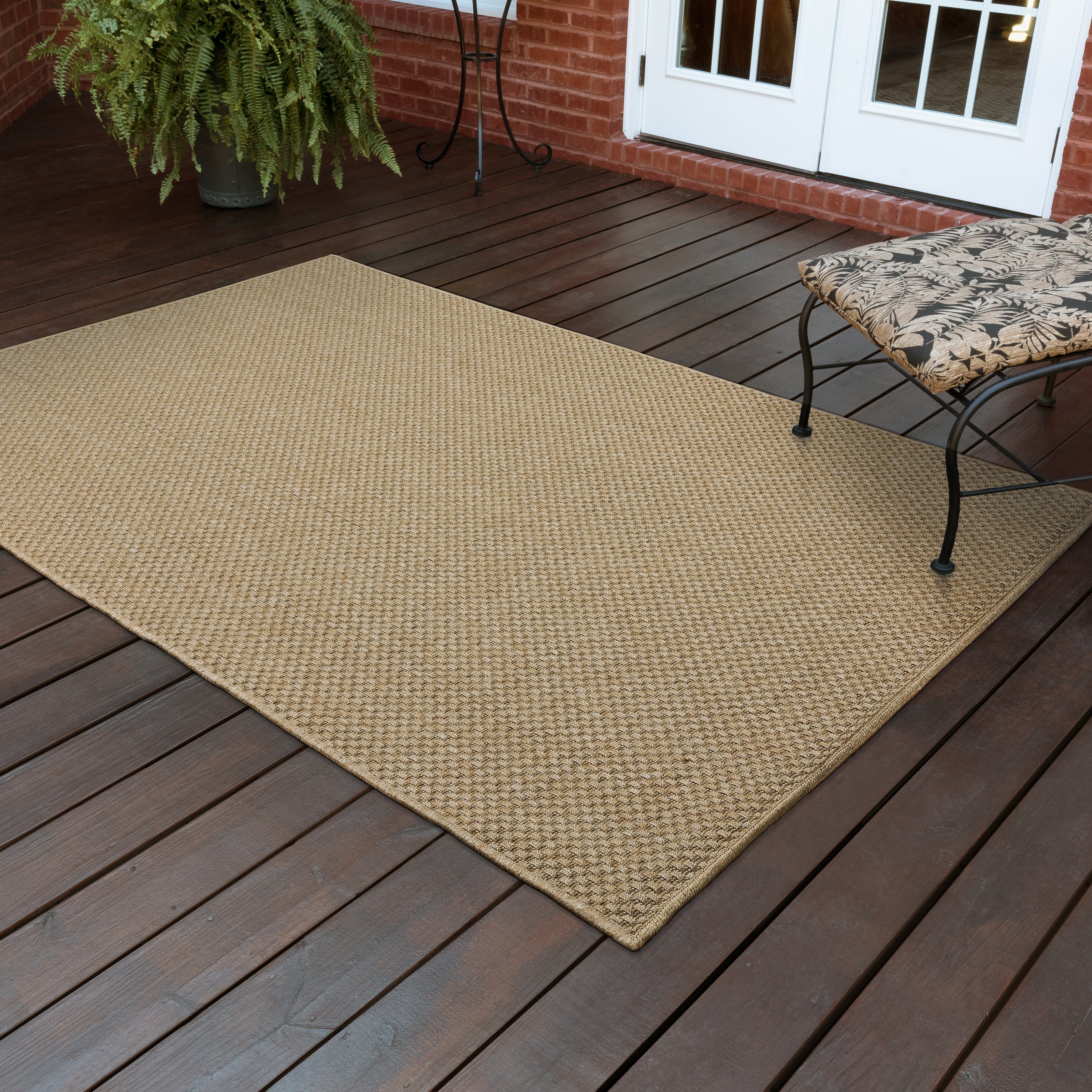 Natural beige textured woven rug with subtle crosshatch pattern