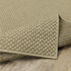 Natural beige textured woven rug with subtle crosshatch pattern