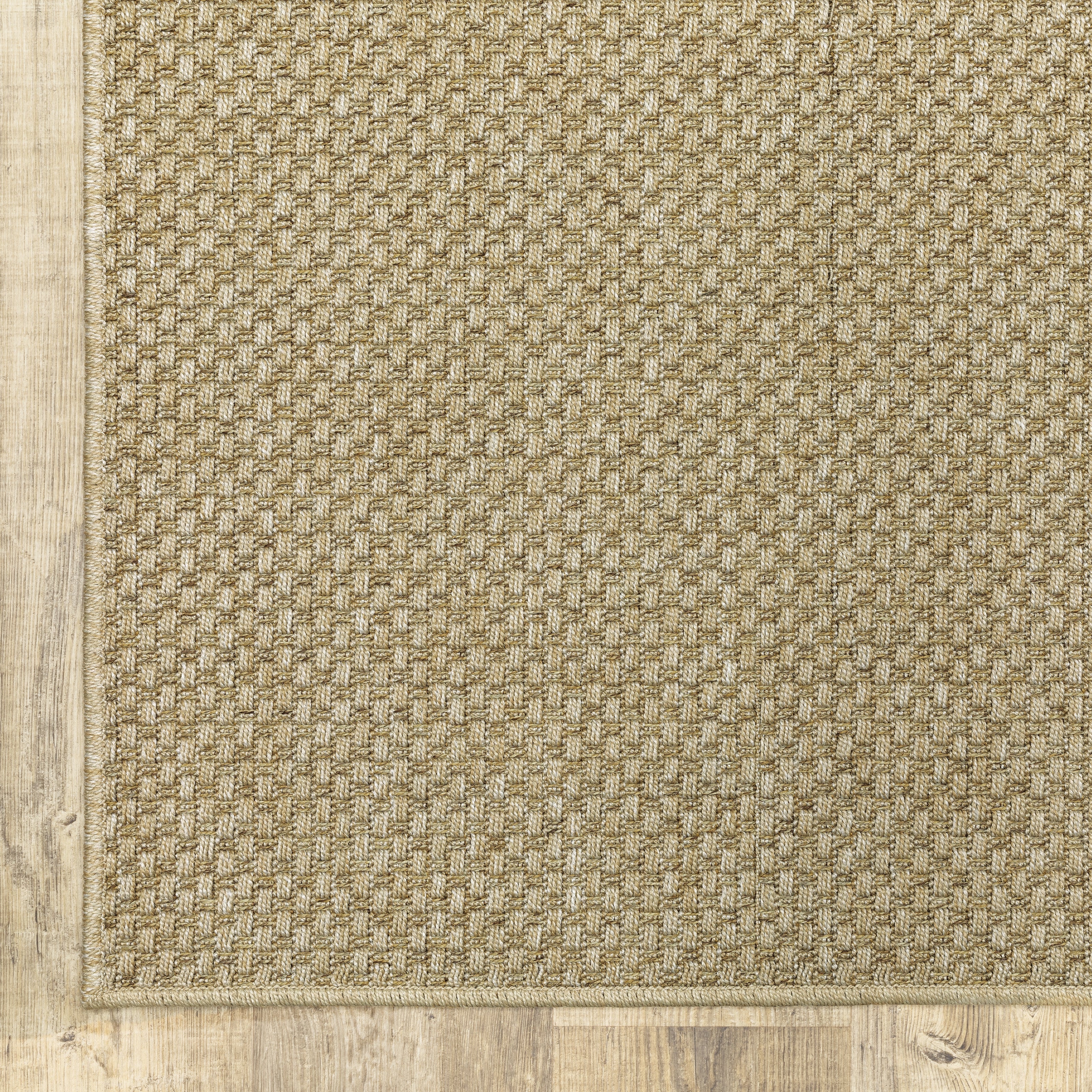 Natural beige textured woven rug with subtle crosshatch pattern