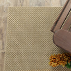 Natural beige textured woven rug with subtle crosshatch pattern