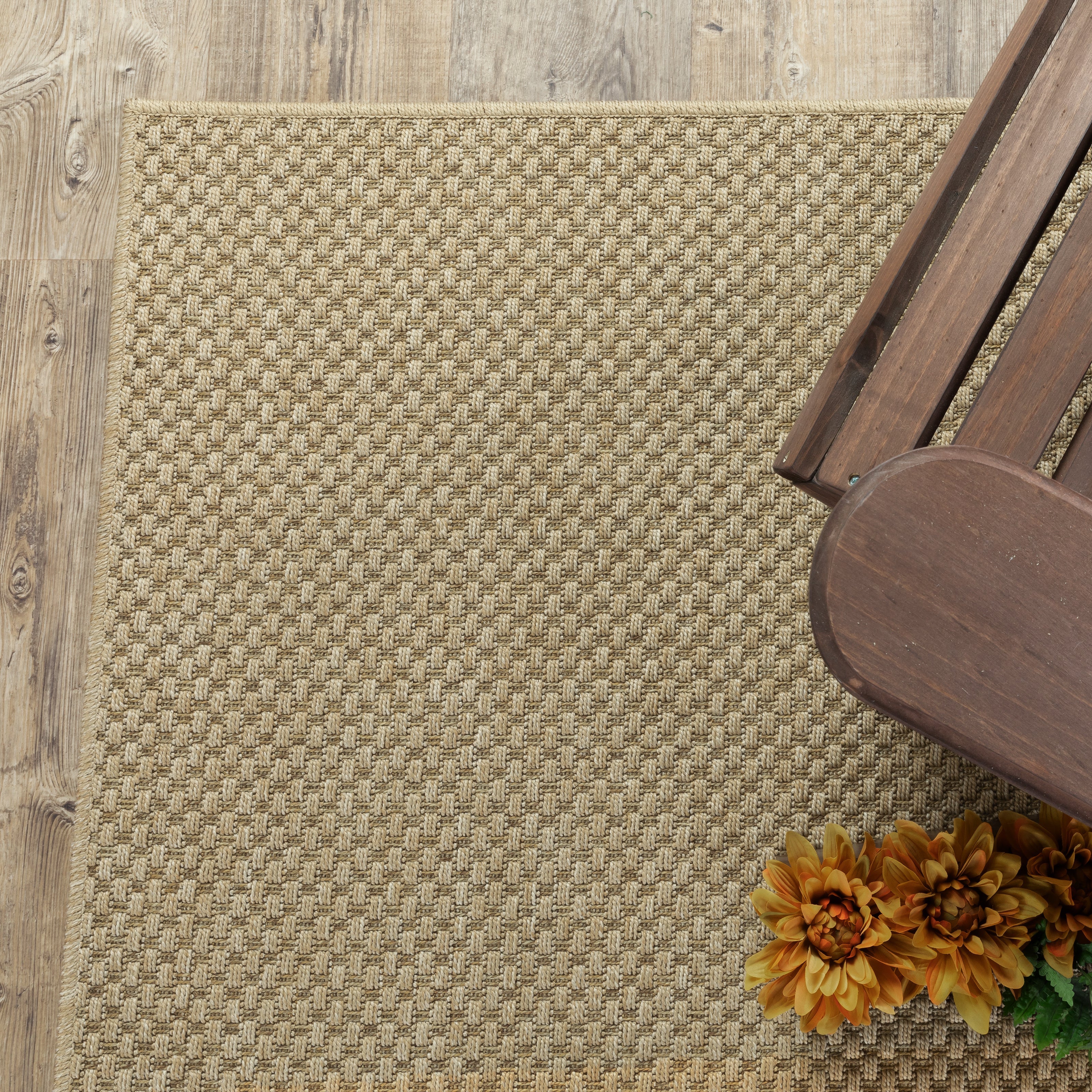 Natural beige textured woven rug with subtle crosshatch pattern