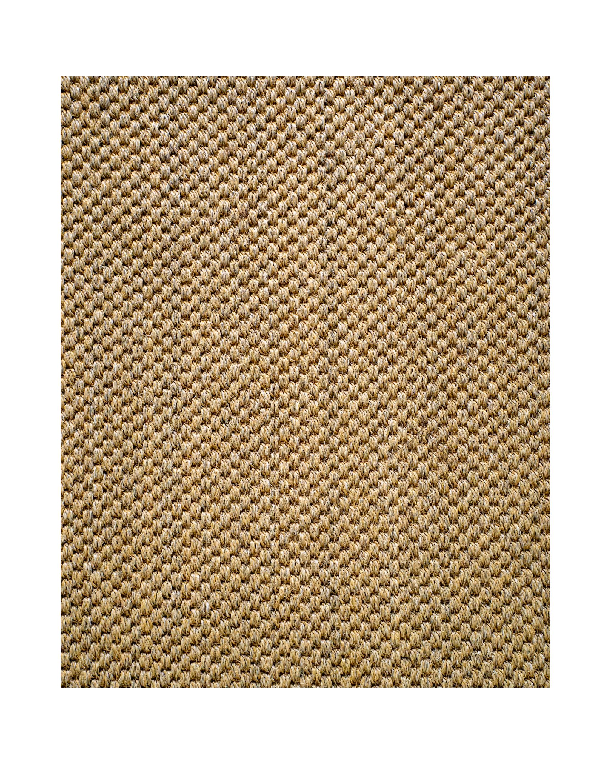 Beige woven sisal rug with diagonal ribbed texture pattern