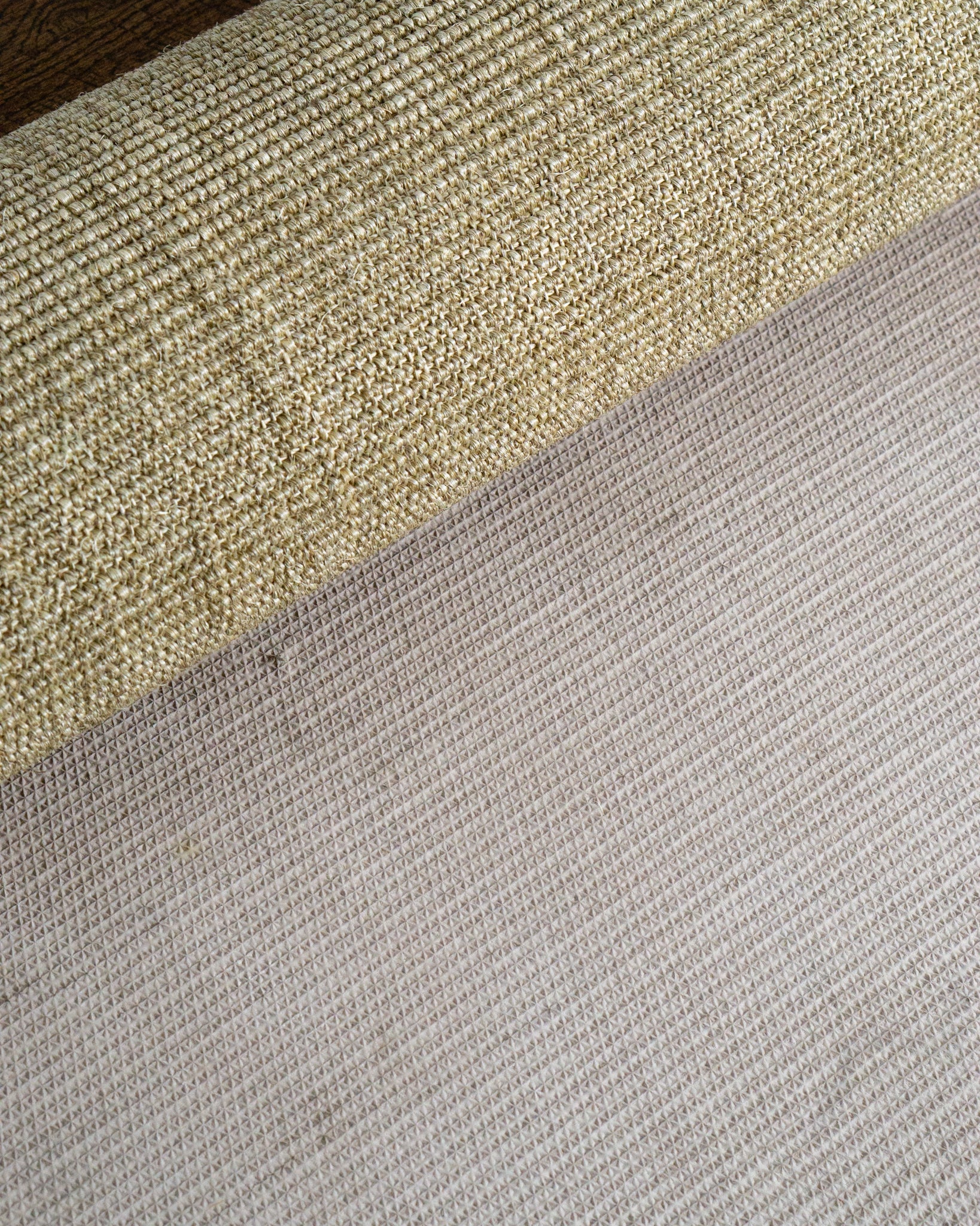 Natural woven texture rug with neutral tan and beige tones in flat weave style