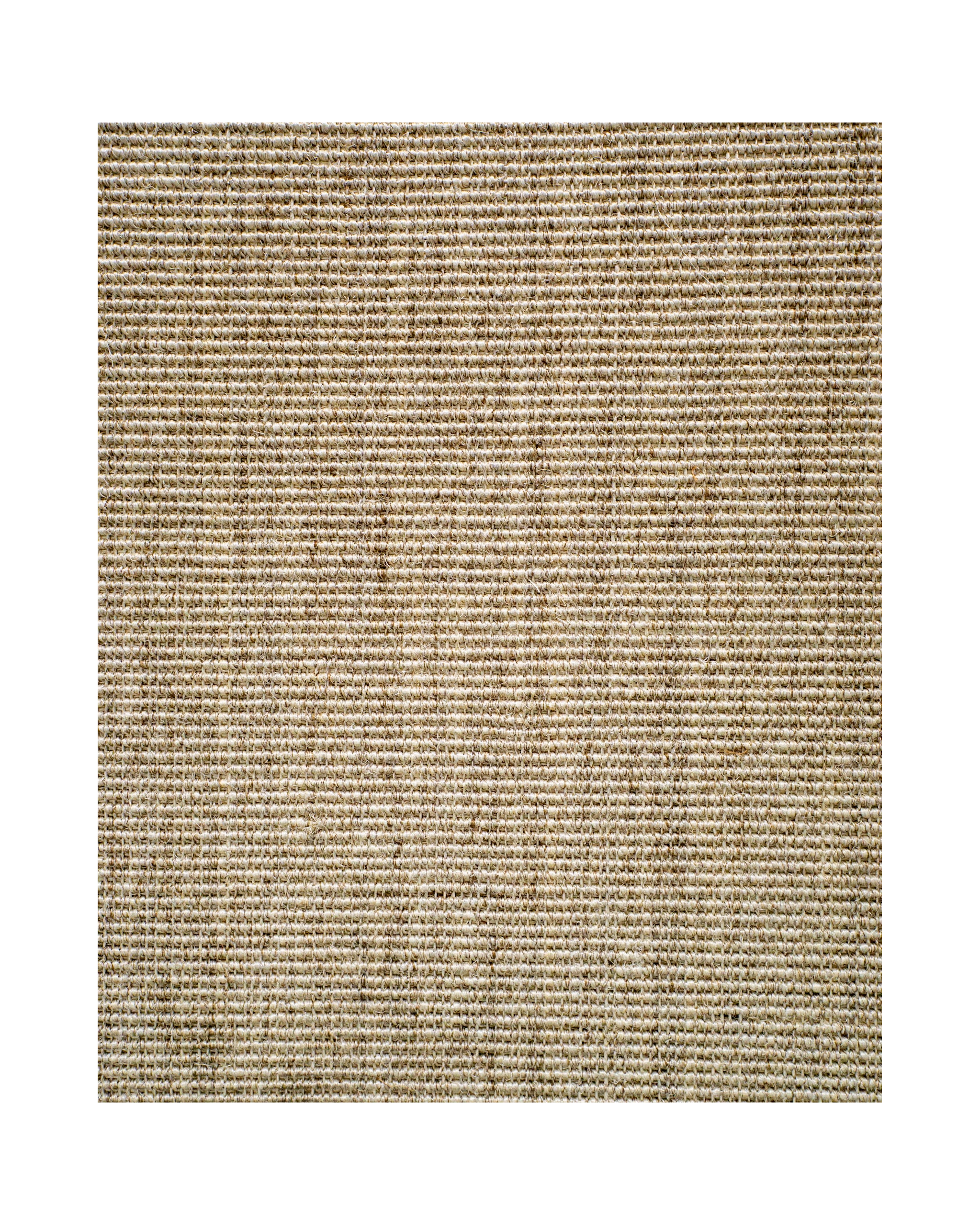Natural woven texture rug with neutral tan and beige tones in flat weave style