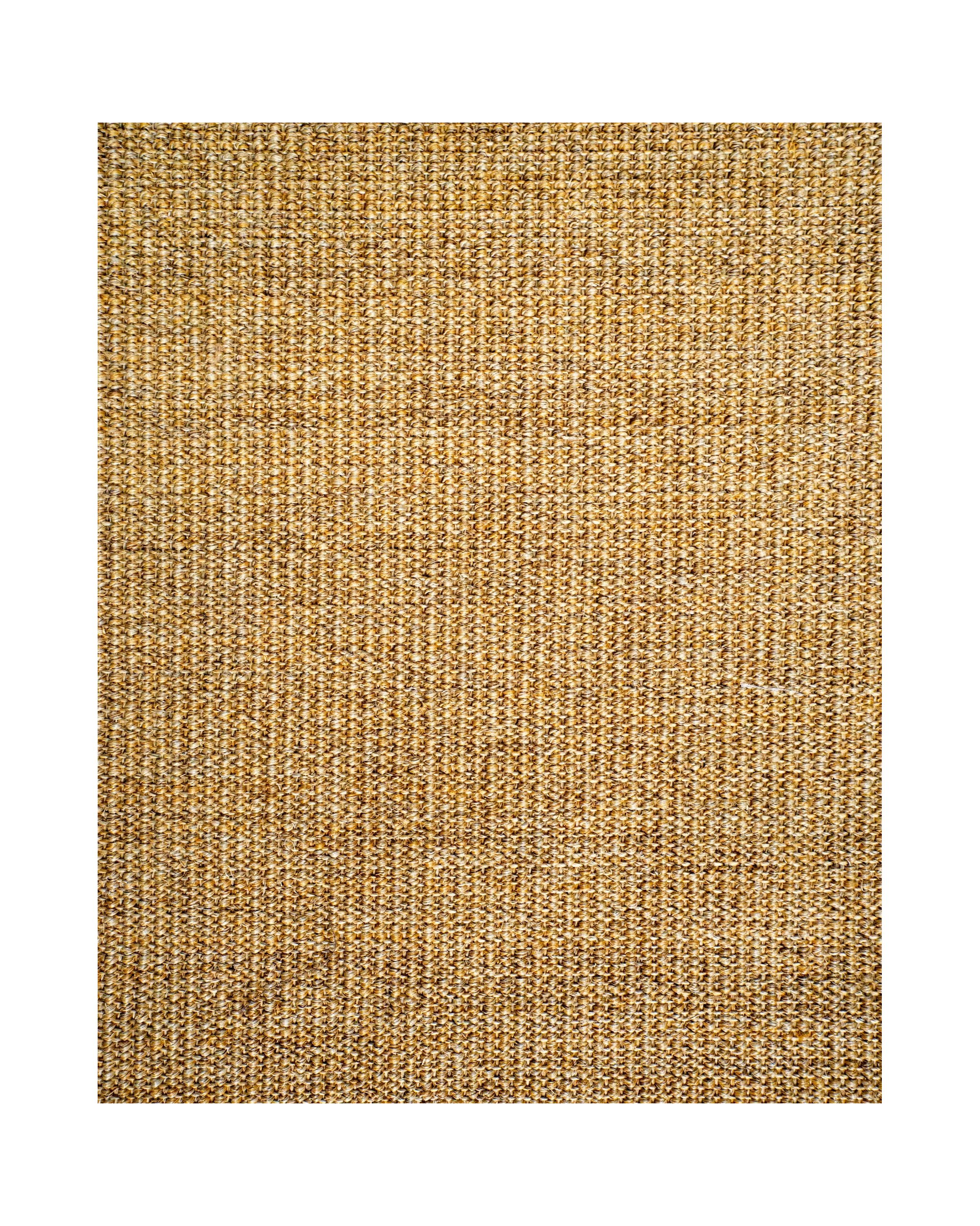 Natural woven jute rug with tight ribbed texture in golden tan color