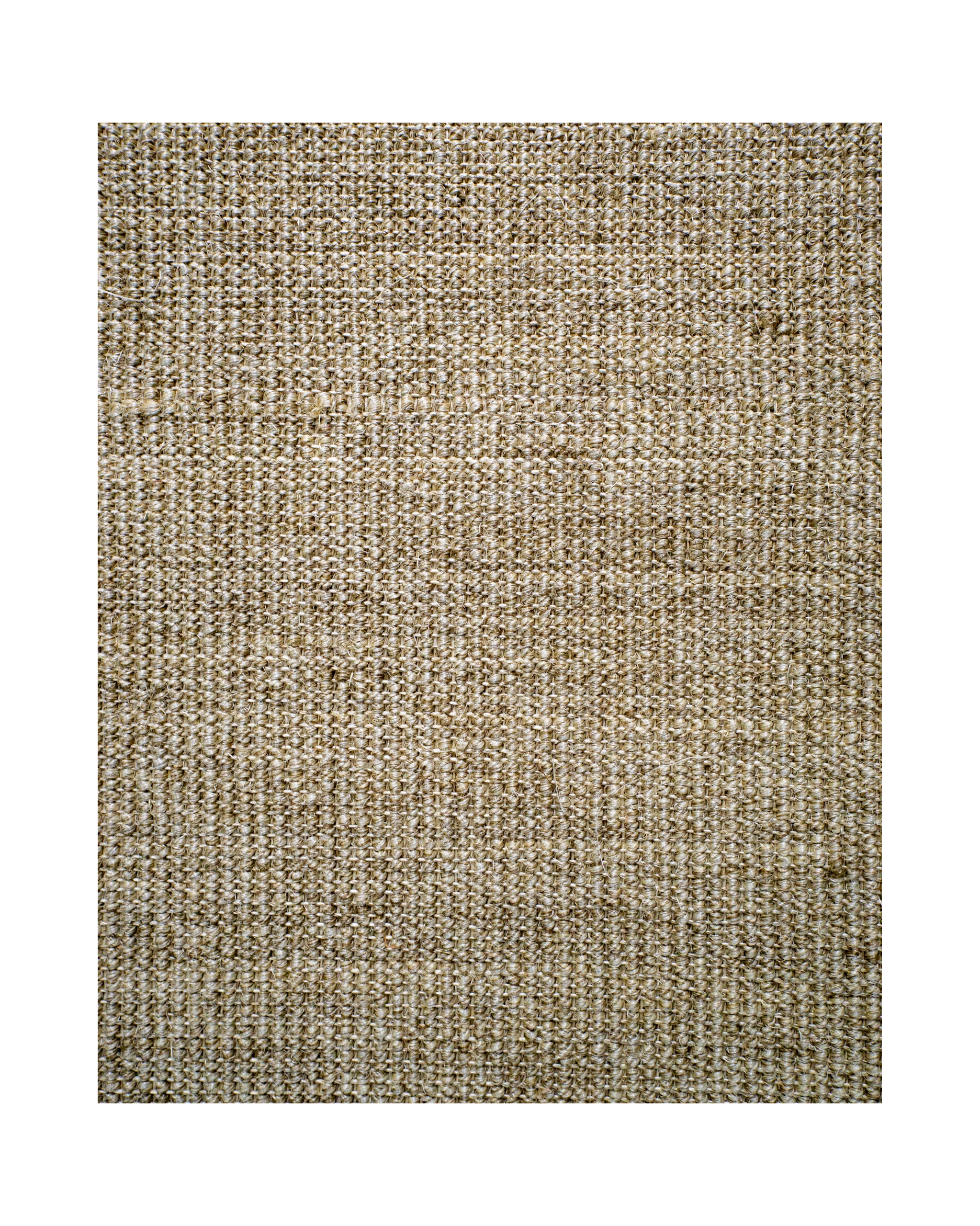 Neutral beige textured woven rug with ribbed pattern in natural fibers