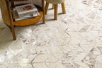 Beige isometric geometric rug with brown abstract pattern and distressed texture