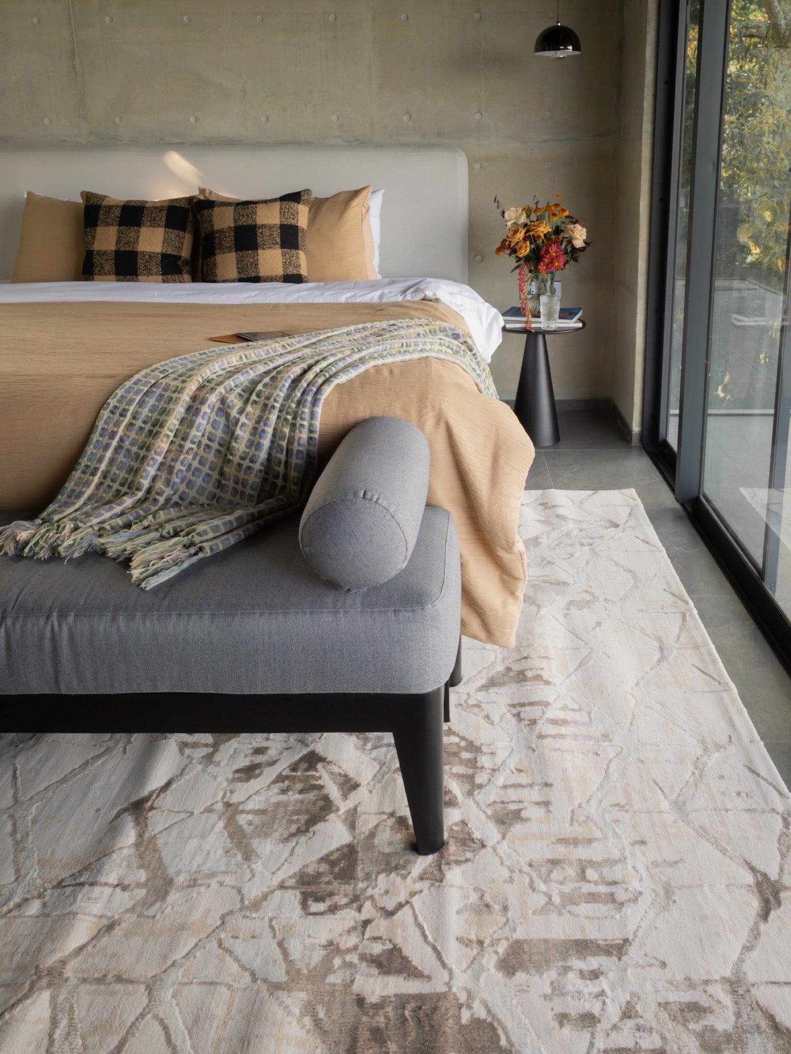 Beige isometric geometric rug with brown abstract pattern and distressed texture
