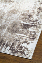Distressed cream and grey area rug with vintage abstract pattern and worn texture