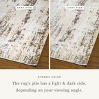 Distressed beige and grey rug with abstract texture and worn vintage aesthetic