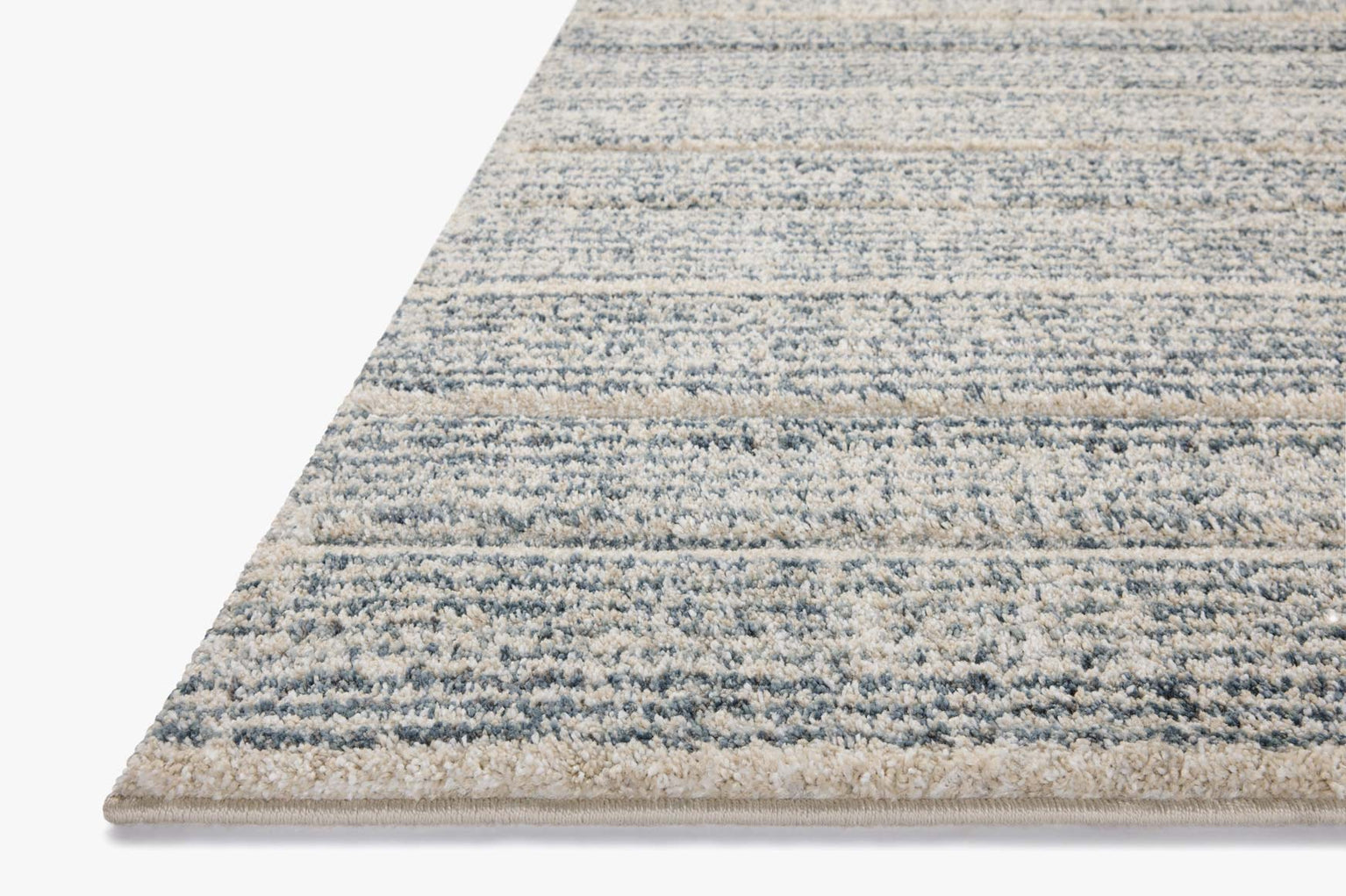 Modern striped area rug in grey, beige and cream tones with textured weave