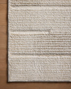 Neutral beige striped area rug with subtle texture and horizontal pattern detail