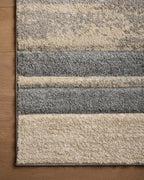 Modern geometric block pattern area rug in grey, beige and tan tones