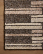 Modern geometric striped rug in brown and beige tones with textured pattern