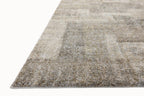Beige and gray geometric patterned rug with textured woven surface
