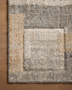 Modern geometric block pattern rug in beige, grey, and tan tones