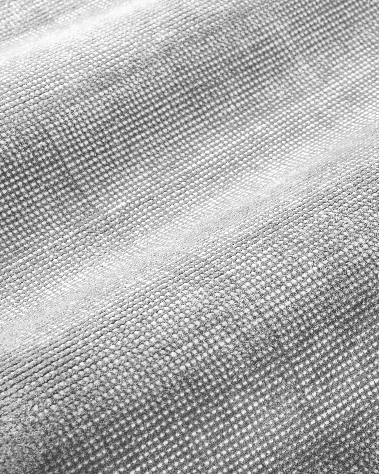 Soft gray wool area rug with subtle texture and natural weave pattern