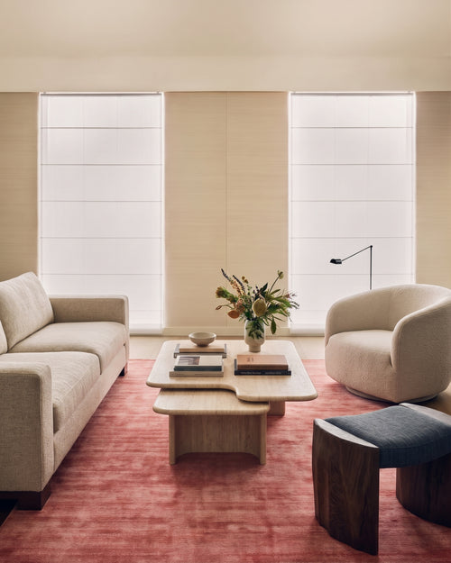 Amara viscose hand-loomed area rug in Coral Pink, lifestyle room view