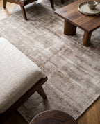Amara viscose hand-loomed area rug in Dark Brown, lifestyle close-up