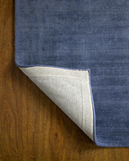 Amara viscose hand-loomed area rug in Deep Navy, backing view