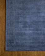 Amara viscose hand-loomed area rug in Deep Navy, corner detail