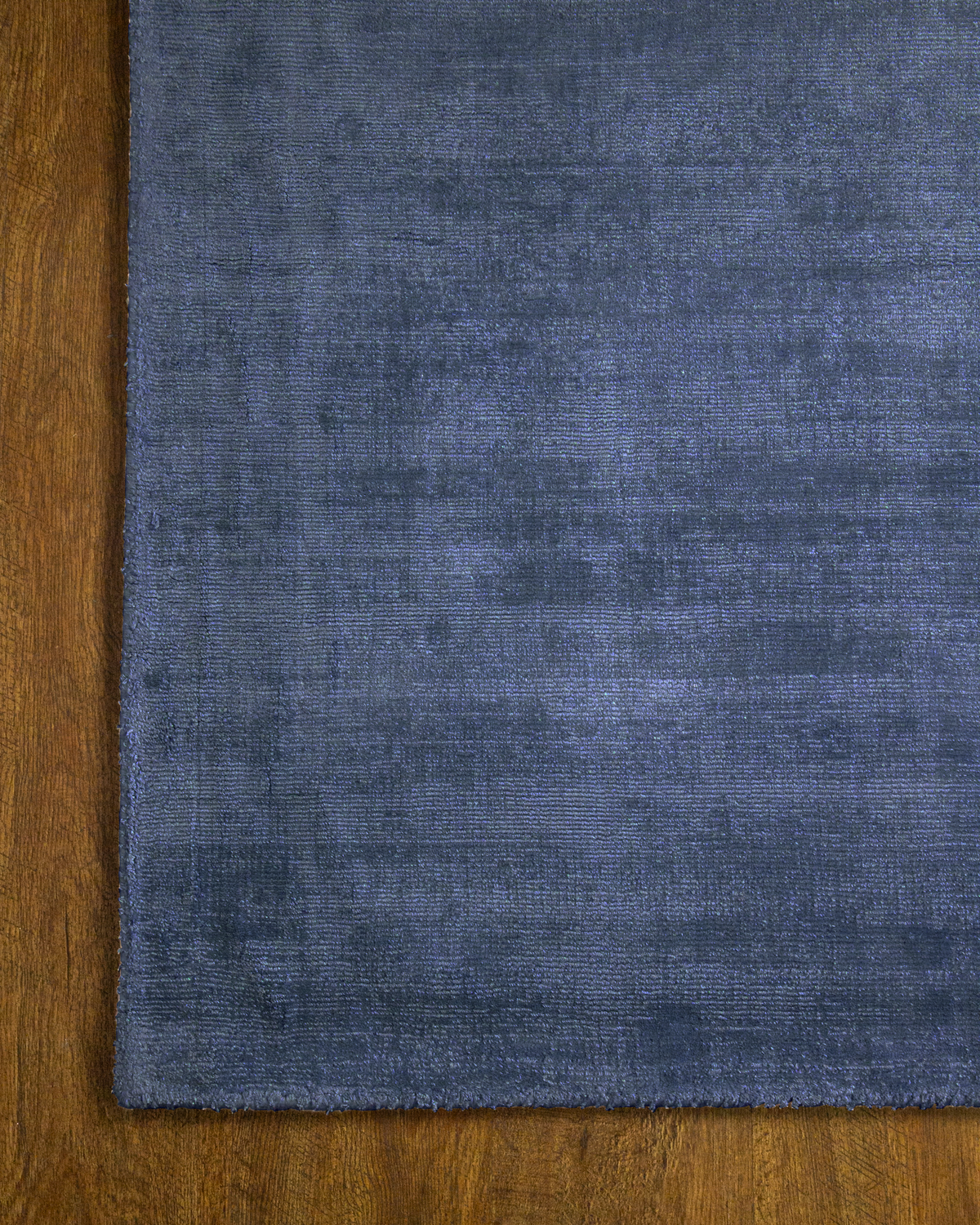 Amara viscose hand-loomed area rug in Deep Navy, corner detail