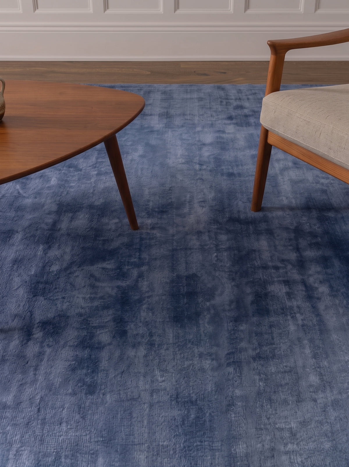 Amara viscose hand-loomed area rug in Deep Navy, lifestyle close-up