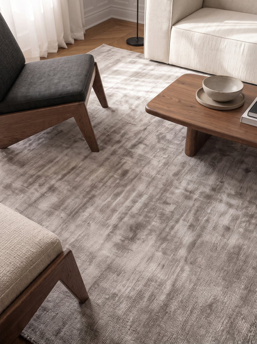Amara viscose hand-loomed area rug in Light Grey, lifestyle close-up