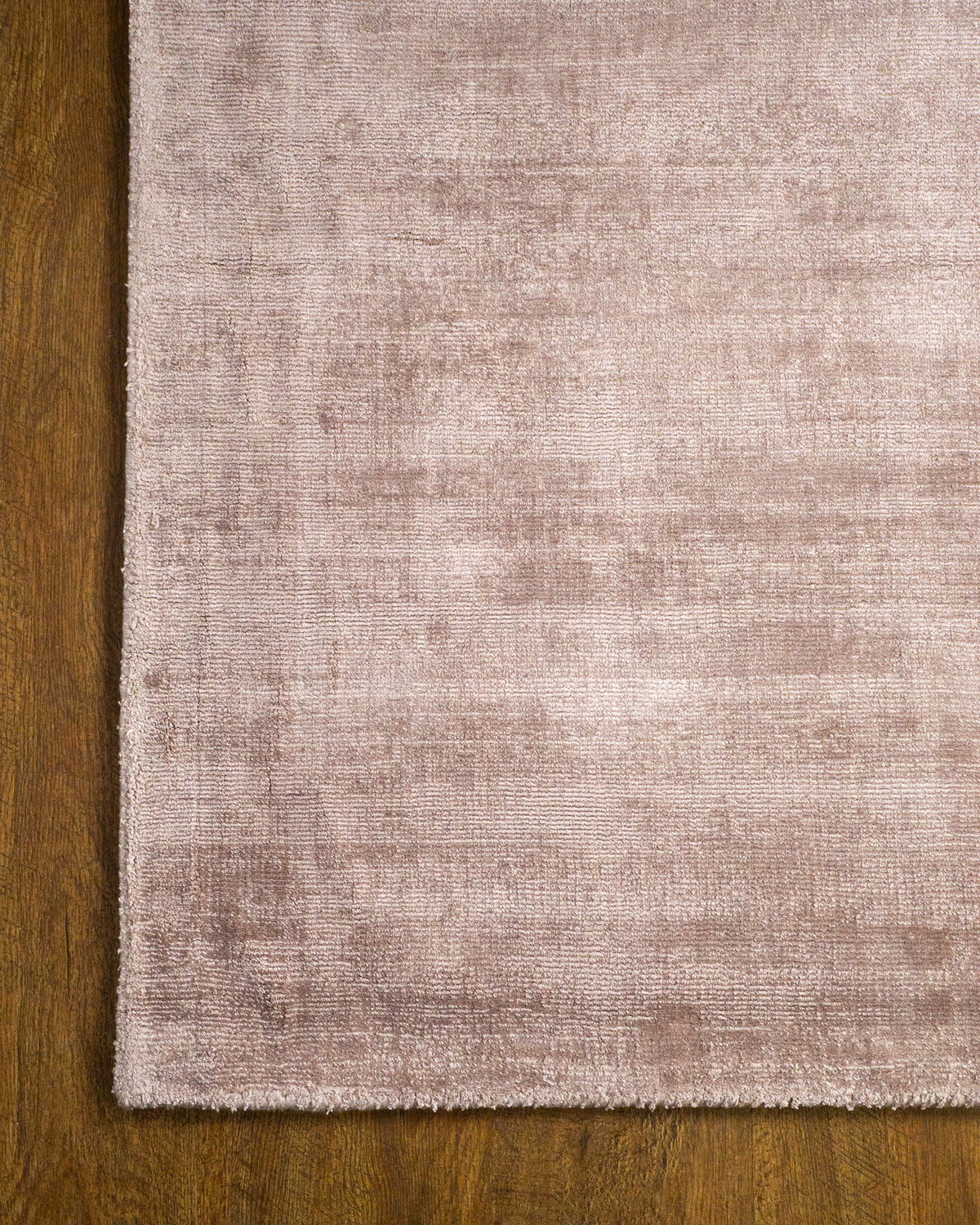 Amara viscose hand-loomed area rug in Light Mauve, corner detail