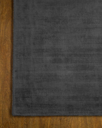 Amara viscose hand-loomed area rug in Navy Black, corner detail