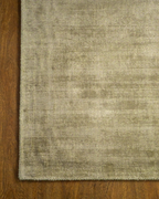 Amara viscose hand-loomed area rug in Olive Brown, corner detail