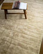 Amara viscose hand-loomed area rug in Shell Beige, styled in a living room
