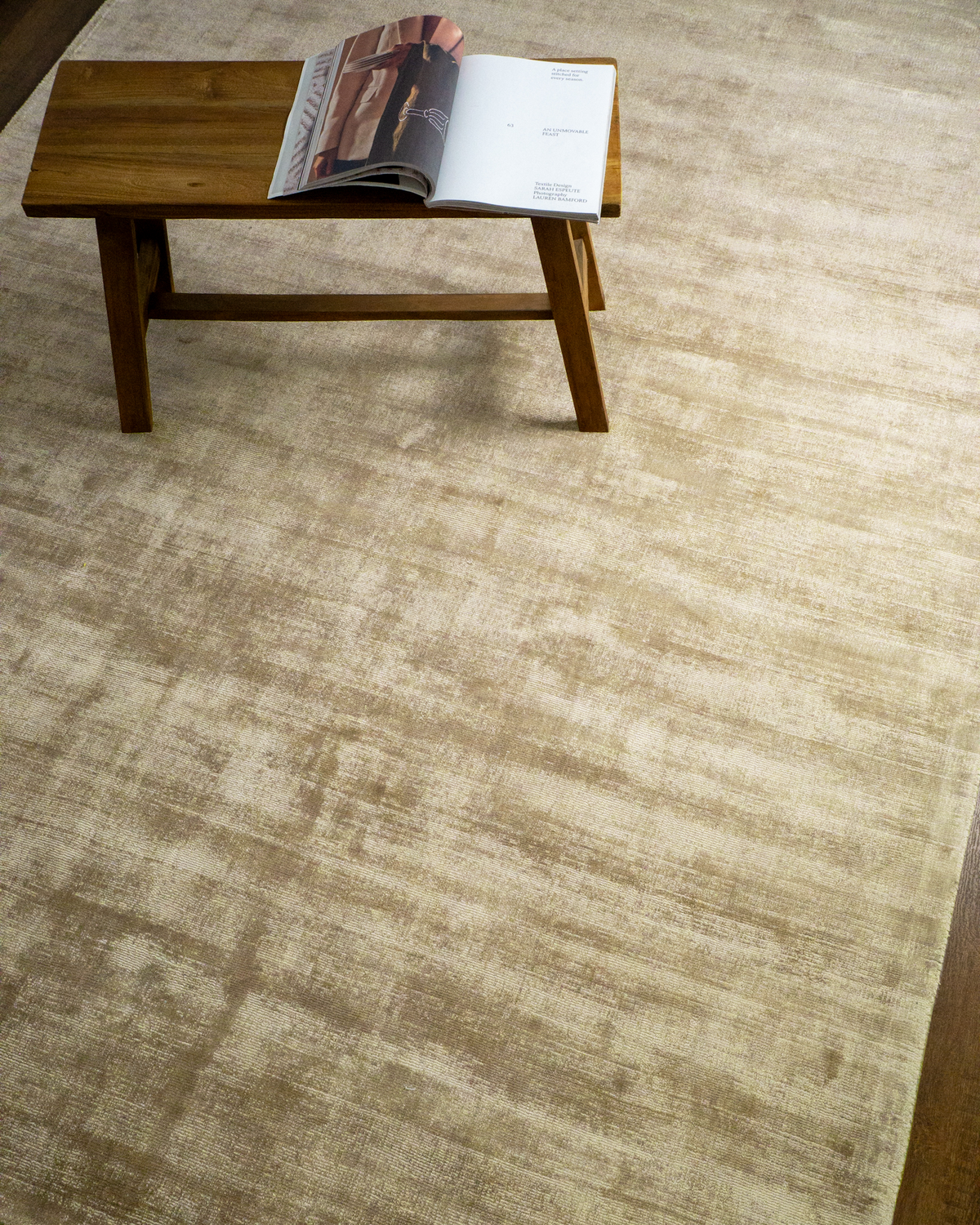 Amara viscose hand-loomed area rug in Shell Beige, styled in a living room