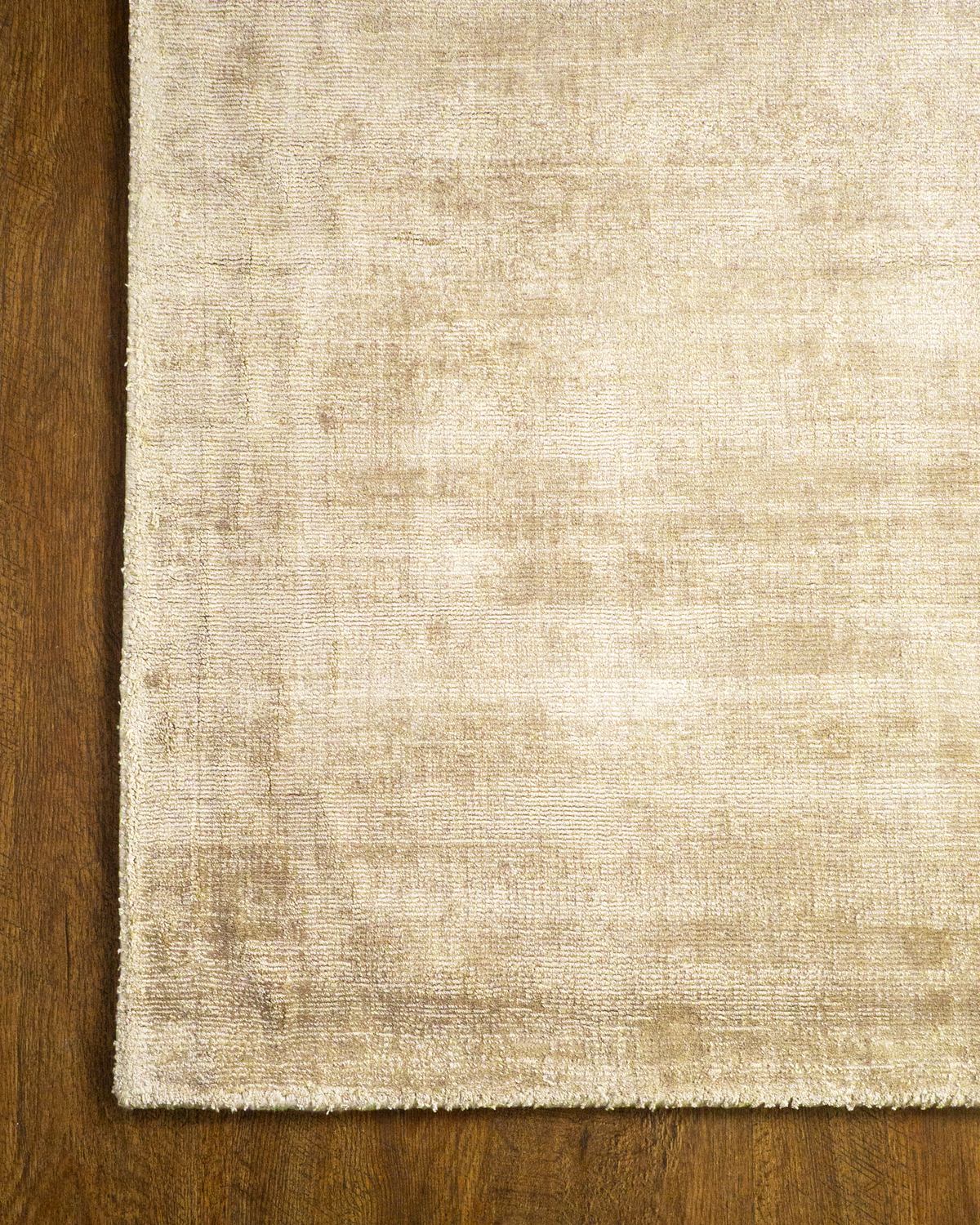 Amara viscose hand-loomed area rug in Shell Beige, corner detail