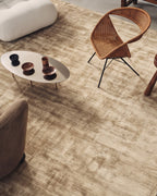Amara viscose hand-loomed area rug in Shell Beige, lifestyle close-up
