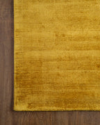 Amara viscose hand-loomed area rug in Yellow, corner detail