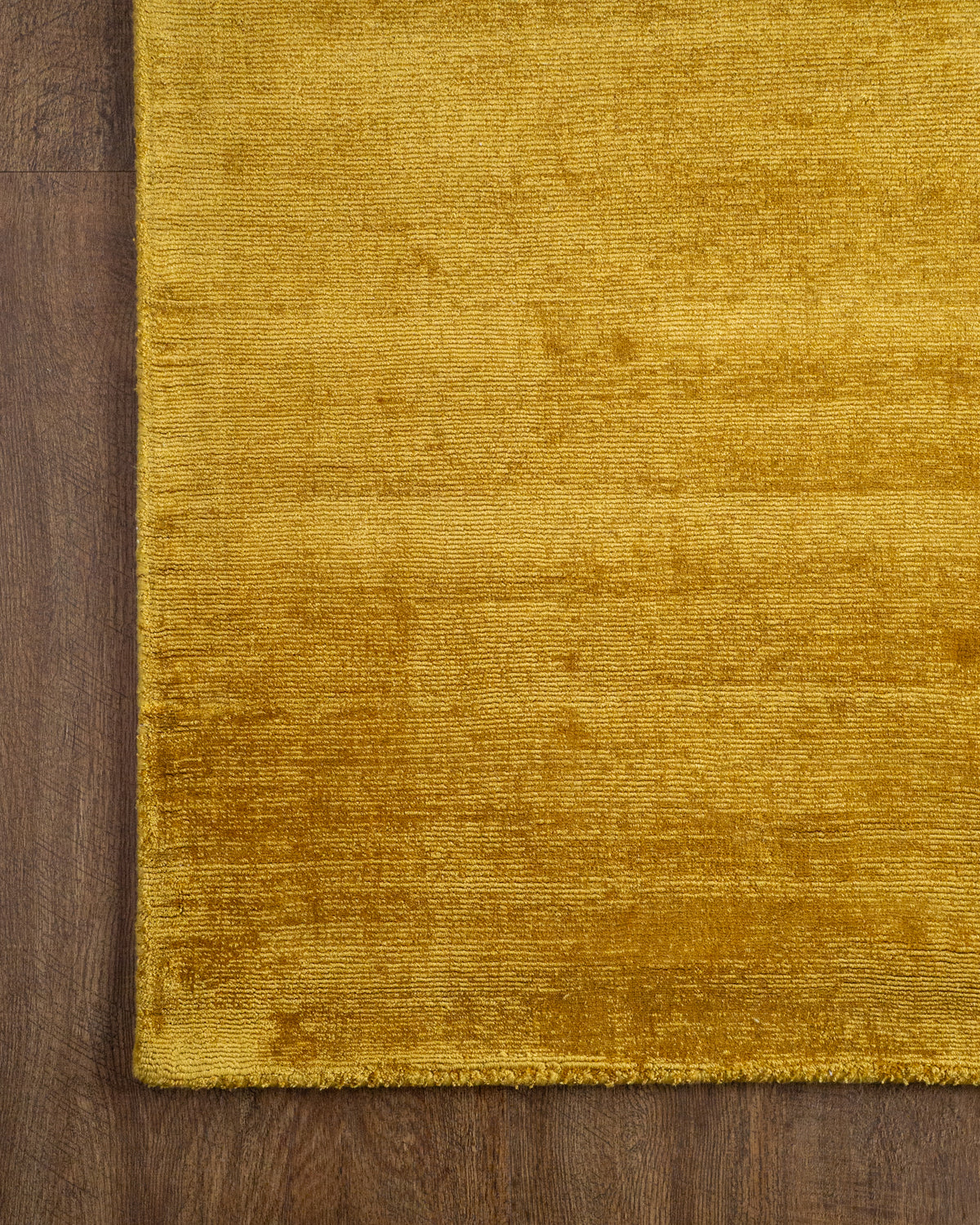Amara viscose hand-loomed area rug in Yellow, corner detail