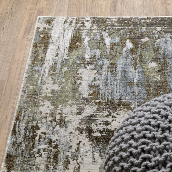 Abstract distressed rug with blue, grey and white textured pattern