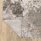 Modern abstract rug with grey and cream distressed pattern texture